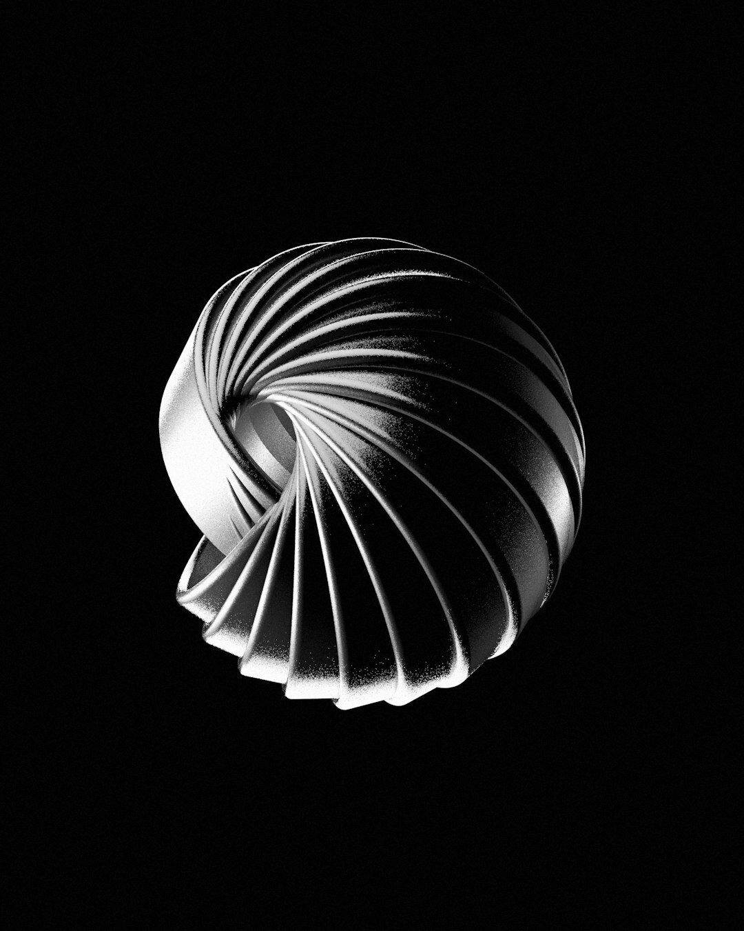 Escultura de diseño contemporáneo fotografiada en un estudio con luz dramática
