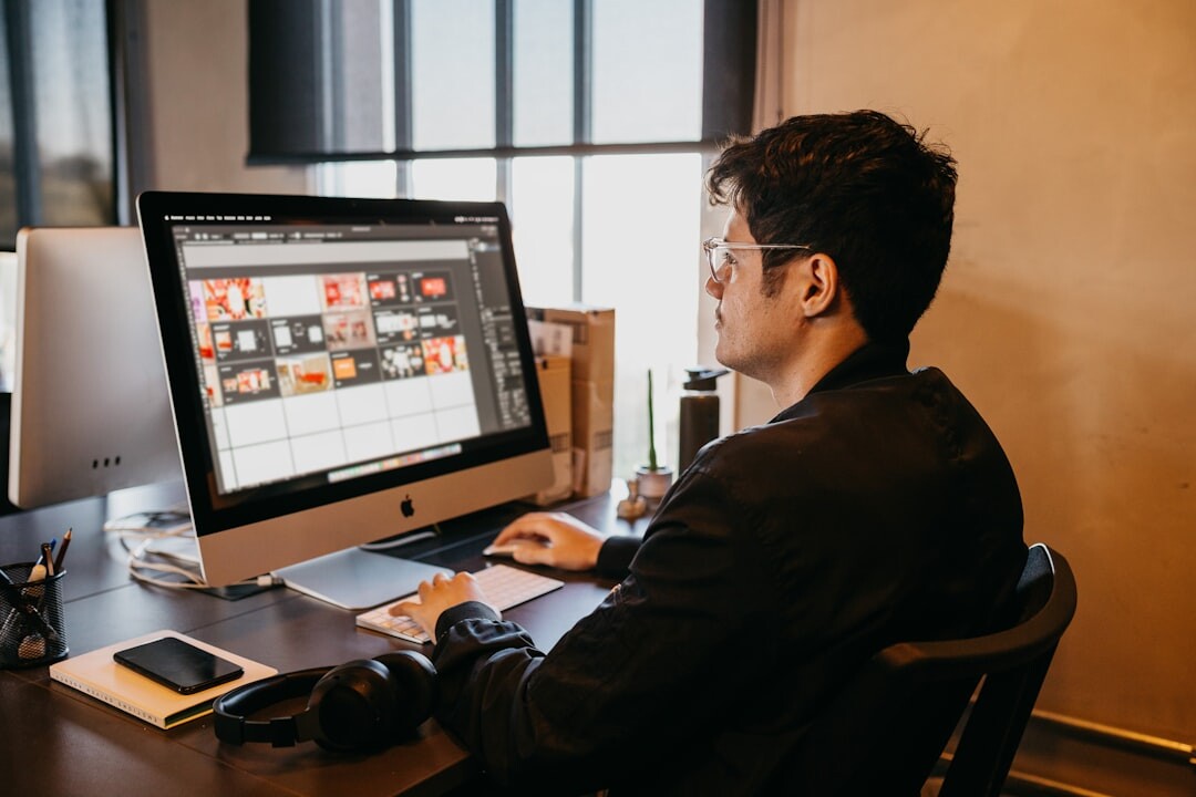 editorial magazine designer at desk